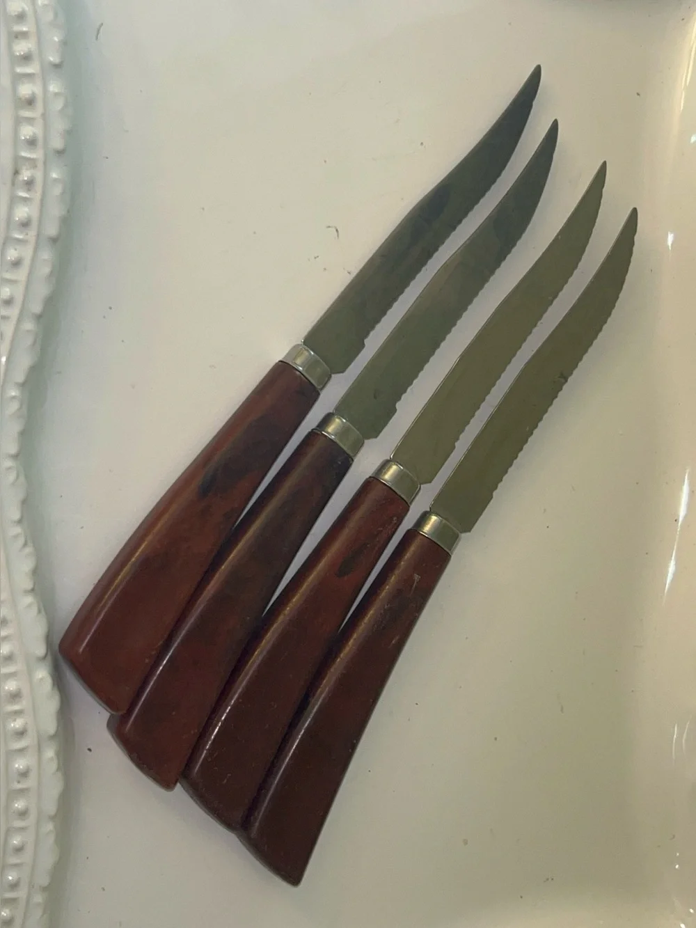 Quikut brown-handled steak knives Set of 4
